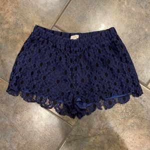 dark bluish/purple and black lace shorts